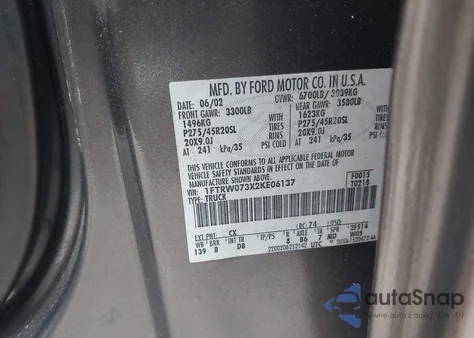 2002 Ford F-150 Lariat из США, поврежденный, VIN 1FTRW073X2KE06137